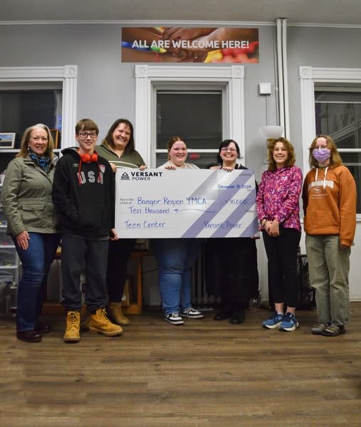 Representatives from Versant Power presented a check to the Bangor YMCA Teen Center to help support their Em-power campaign. 