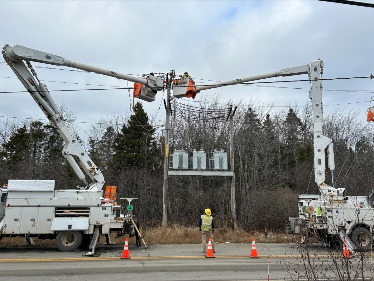 Utility trucks and crew working on the new Tremont Substation