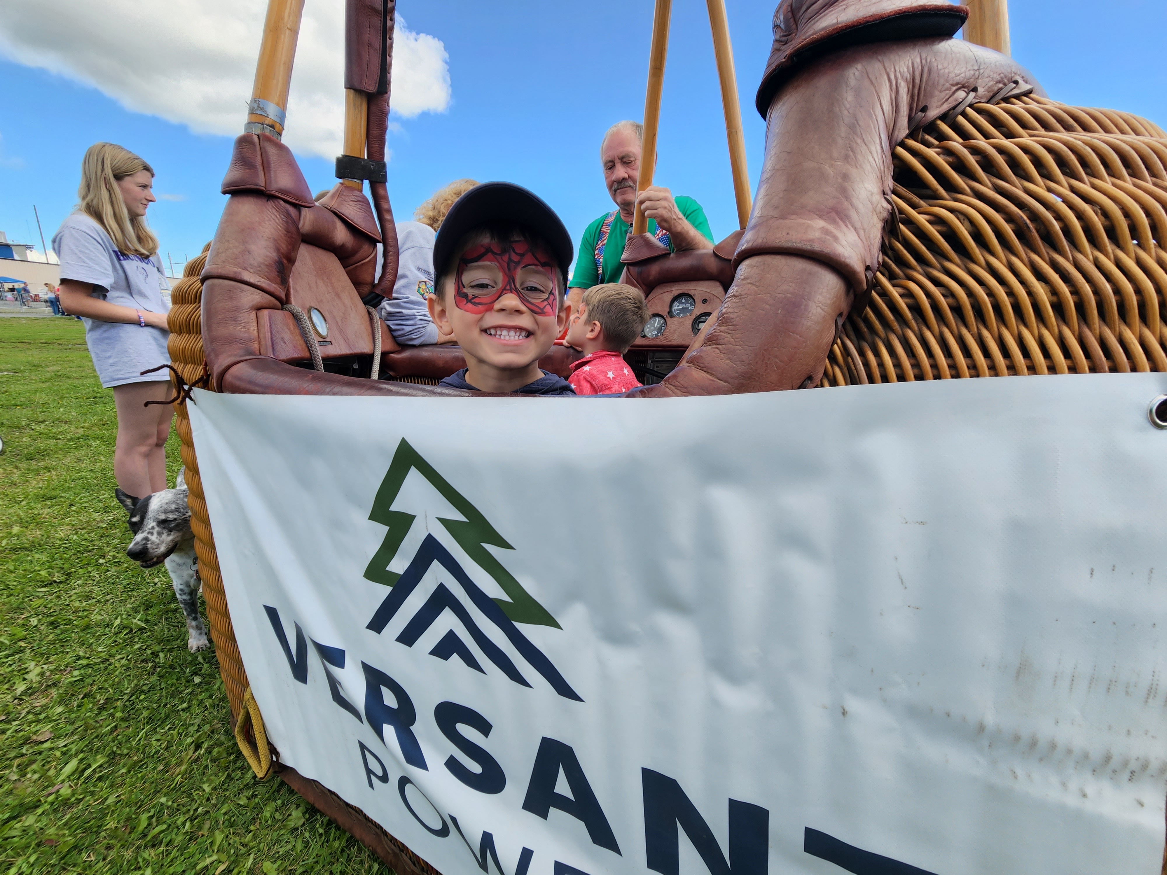 People holding Versant sign